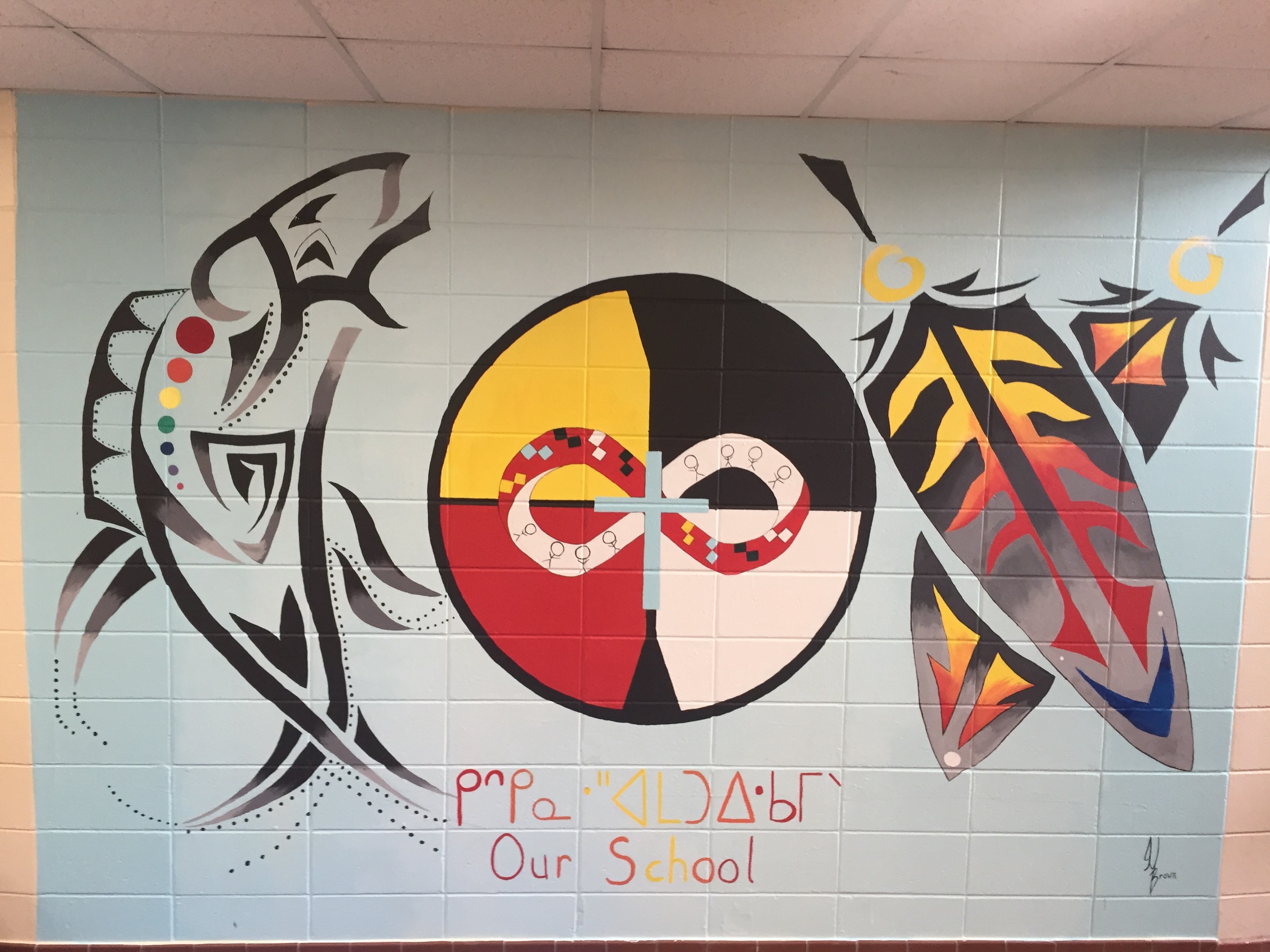 A mural on a school mall that mackenzie painted and designed